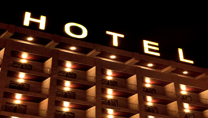 hotel building top signage with illumination