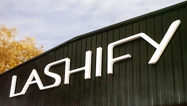 Lashify exterior building letters displaying the brand name made of acrylic and aluminum