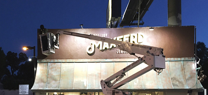 Maxferd lighted building sign's repair and replacement process