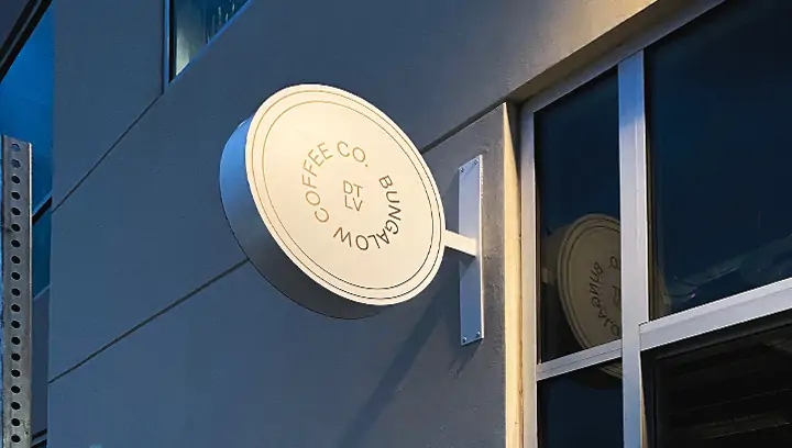 Building signs for Bungalow Coffee Shop fixed on a wall with and double-sided visibility