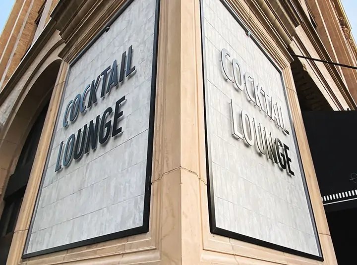 Building signs for Cocktail Lounge with backlit illumination and black lettering