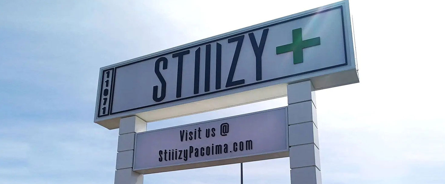 Stiiizy high rise sign in a big size with poles made of lexan, foam board, aluminum and dibond