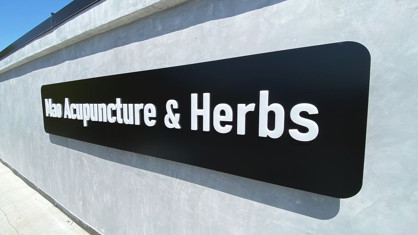 Building push through sign