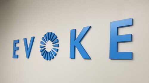 Evoke office acrylic sign