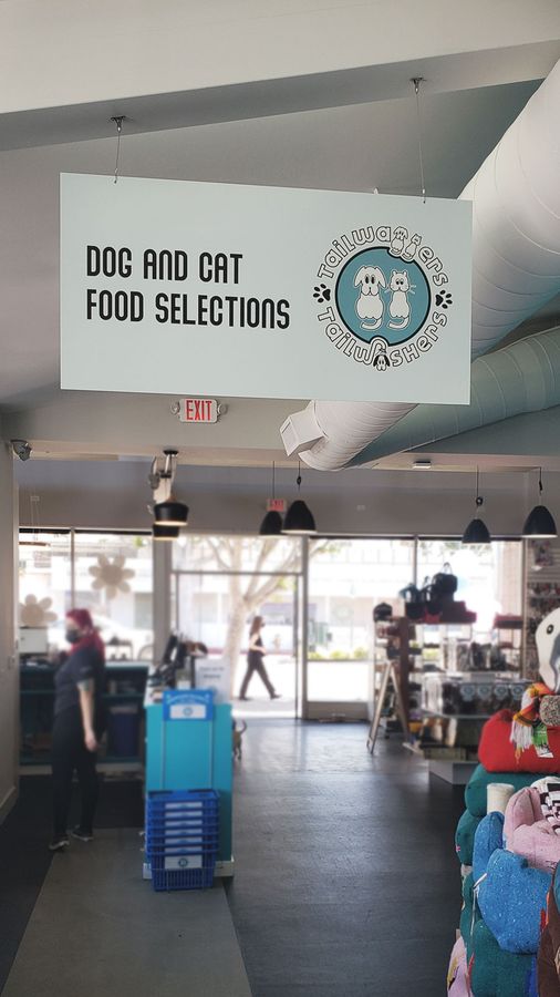 Tailwaggers hanging dibond sign