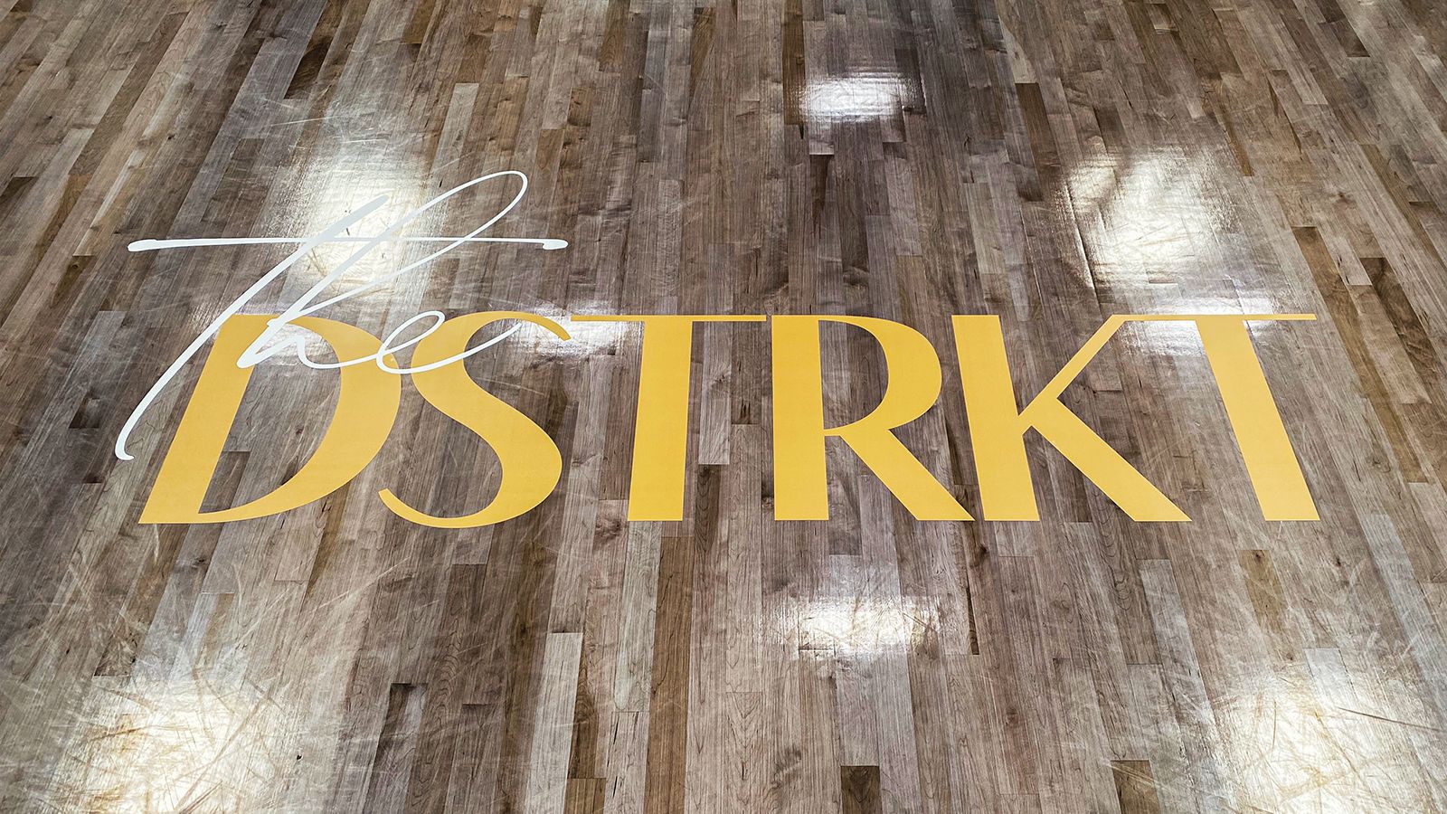 the dstrkt floor vinyl lettering