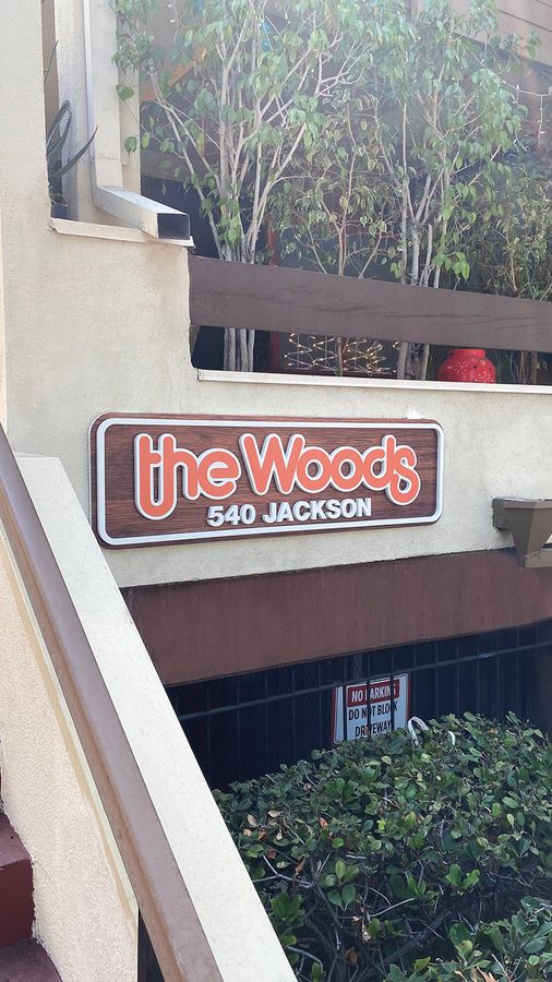 the woods pvc sign
