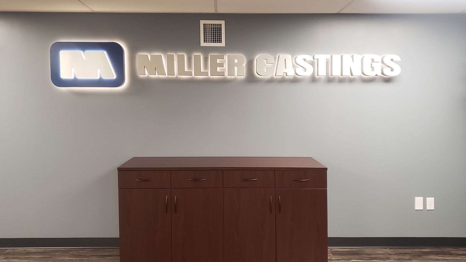 Miller castings backlit sign
