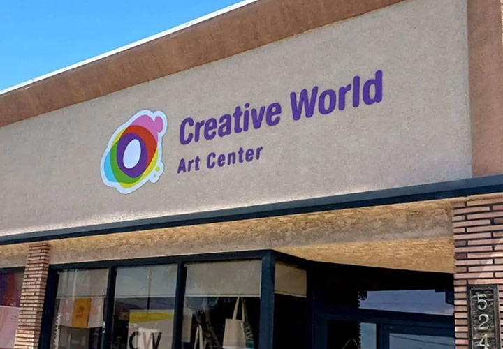 Creative World Art Center outdoor sign with the brand's colorful logo made of aluminum