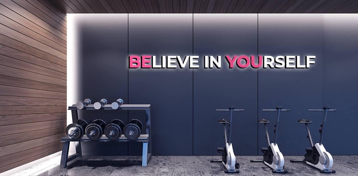 Gym interior design idea displaying a motivational phrase