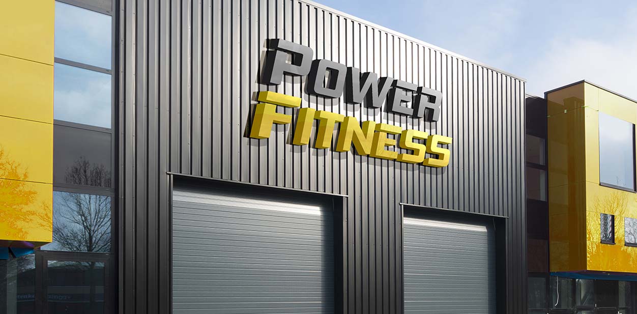 Gym exterior design idea in yellow and grey