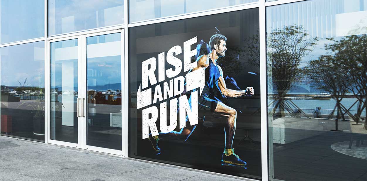 Gym window design idea displaying motivational graphics