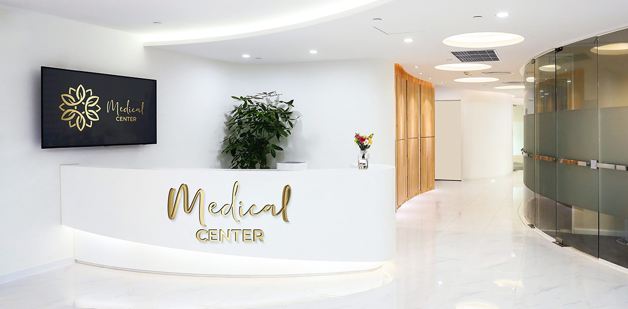 Elegant medical office reception design idea in white, black and golden colors