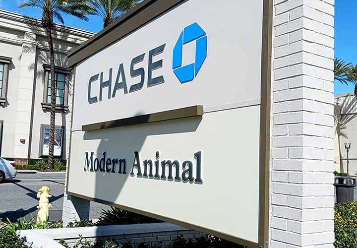 Modern Animal custom outdoor signage in a freestanding style made of aluminum and Lexan