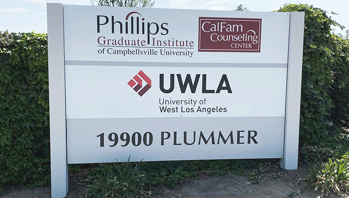 University of West Los Angeles outdoor monument sign made of plywood