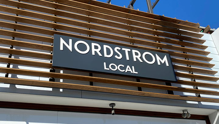 Nordstrom Local exterior sign made of aluminum and acrylic for storefront branding