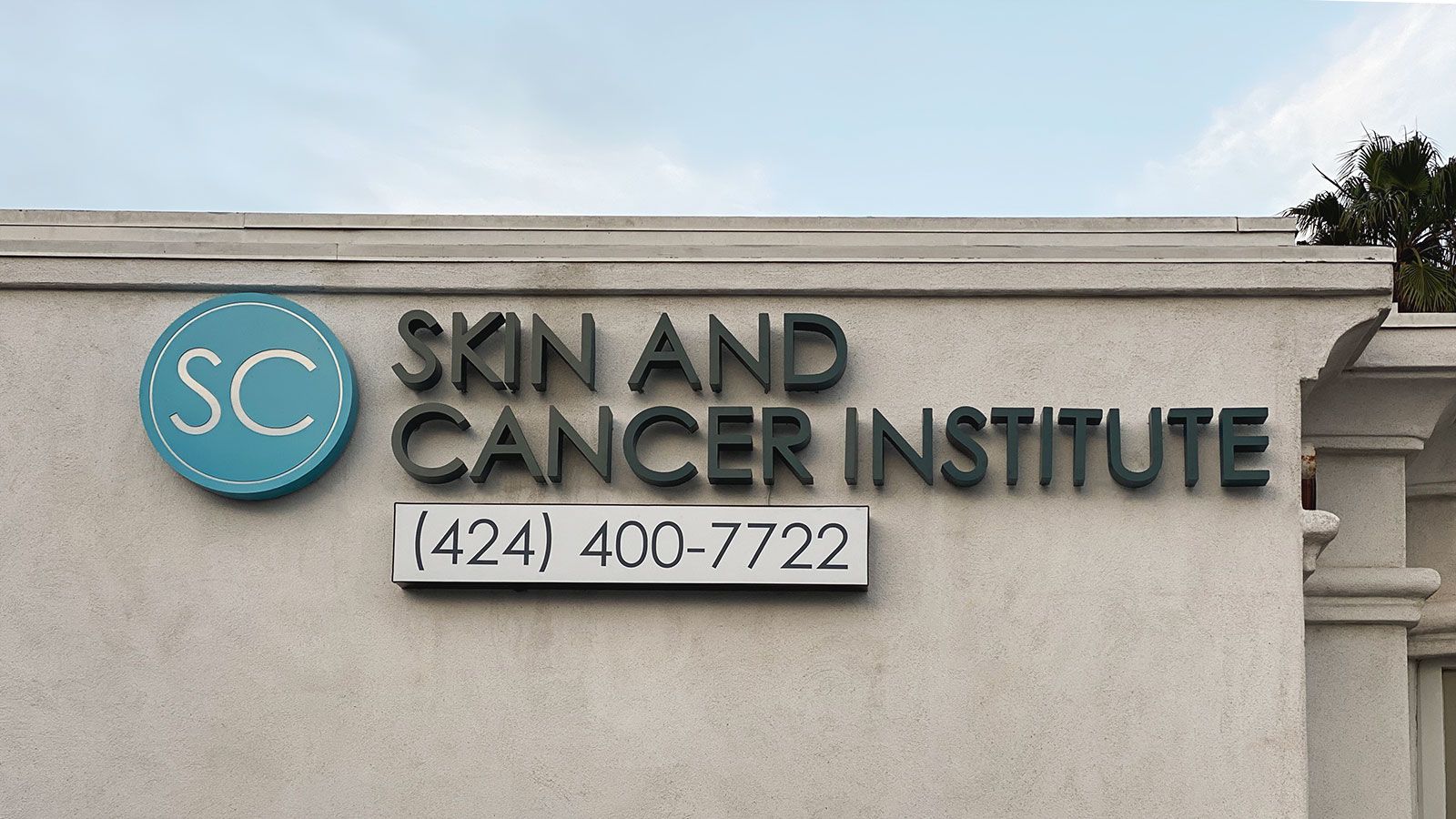 skin and cancer institute building sign