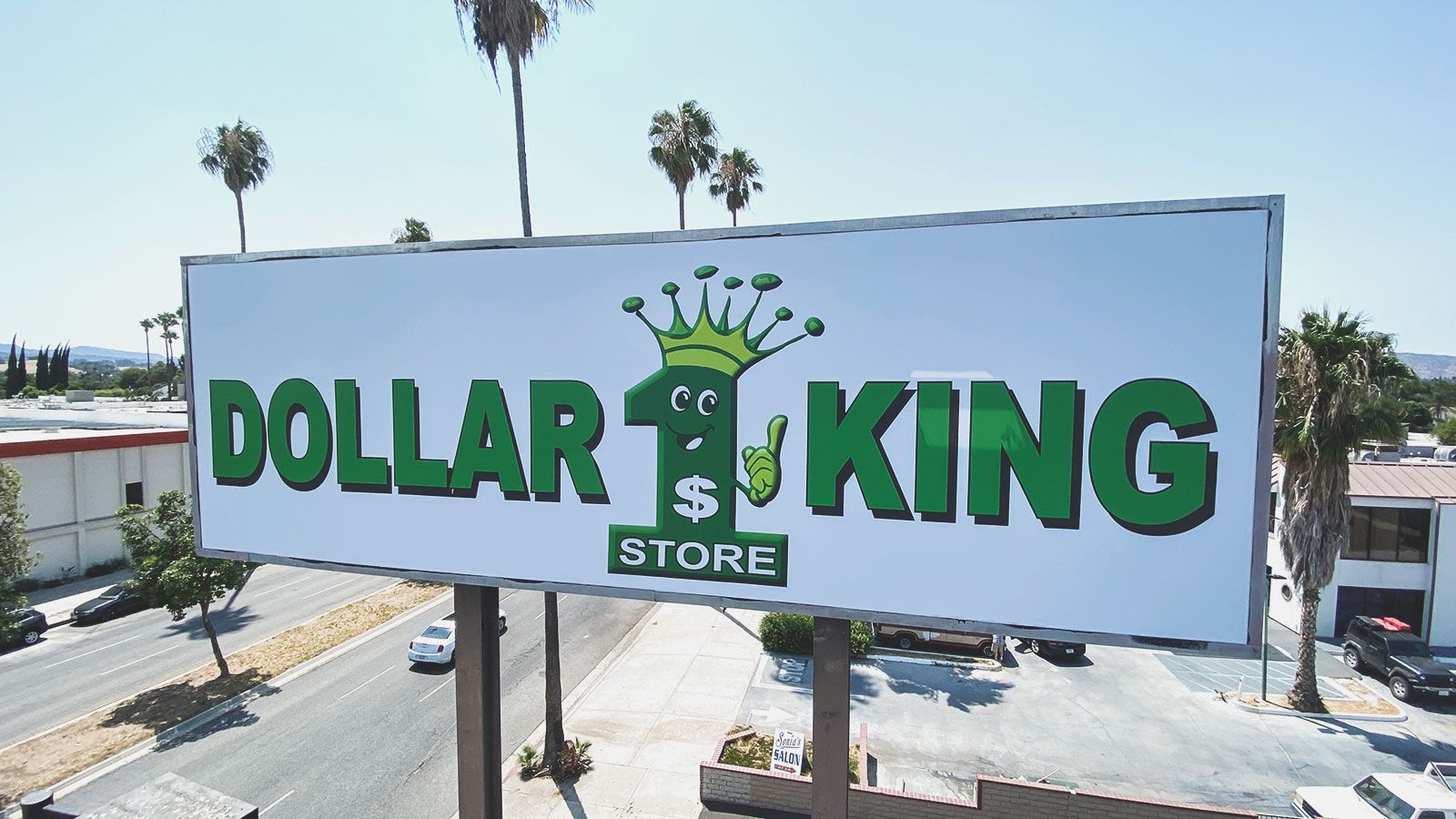 Dollar King backlit banner