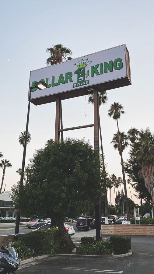 Dollar King high rise sign banner
