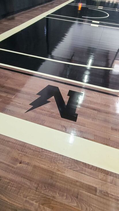 The DSTRKT basketball court vinyl floor decal | Front Signs