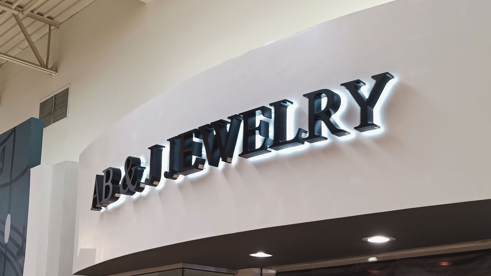 Jewelry store sign reinstallation