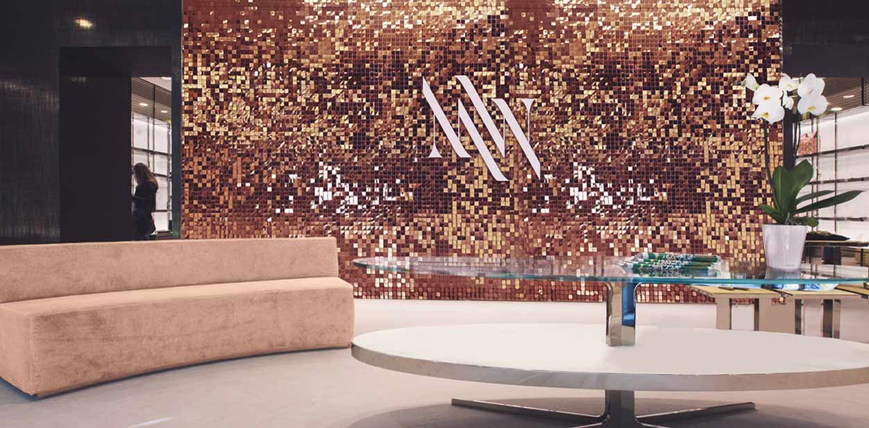Luxury salon design with a decorative faux wall covered with small mirror particles