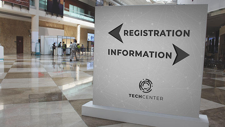 Free standing meeting signage with wayfinding elements guiding to registration and informational centers