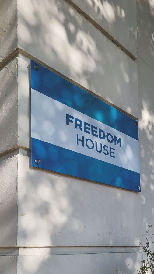 freedom house building sign