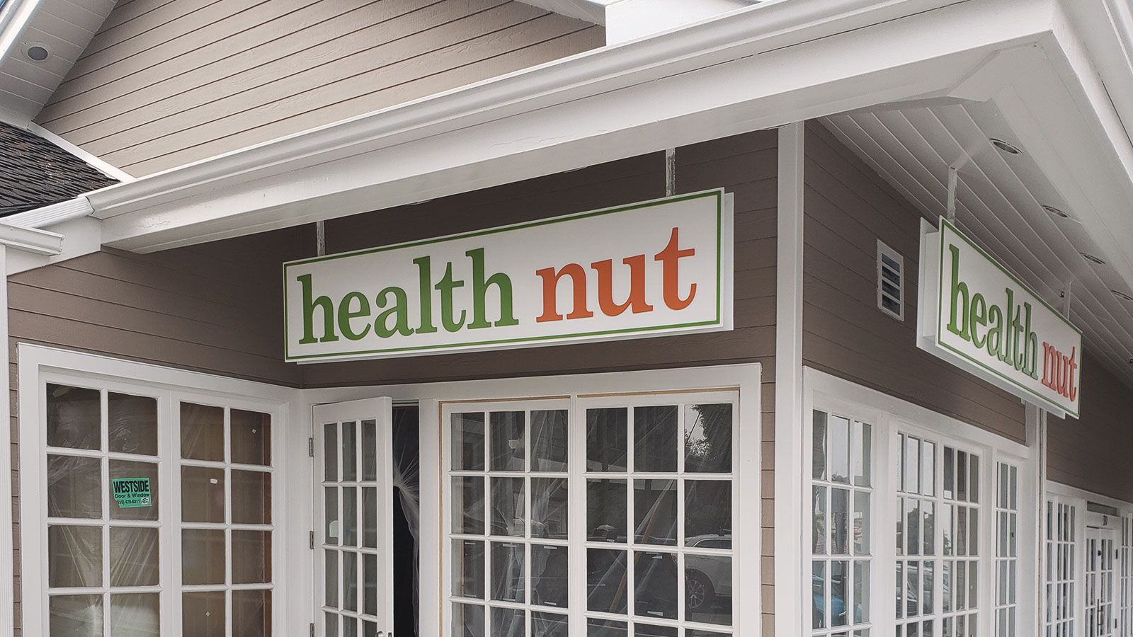health nut hanging sign
