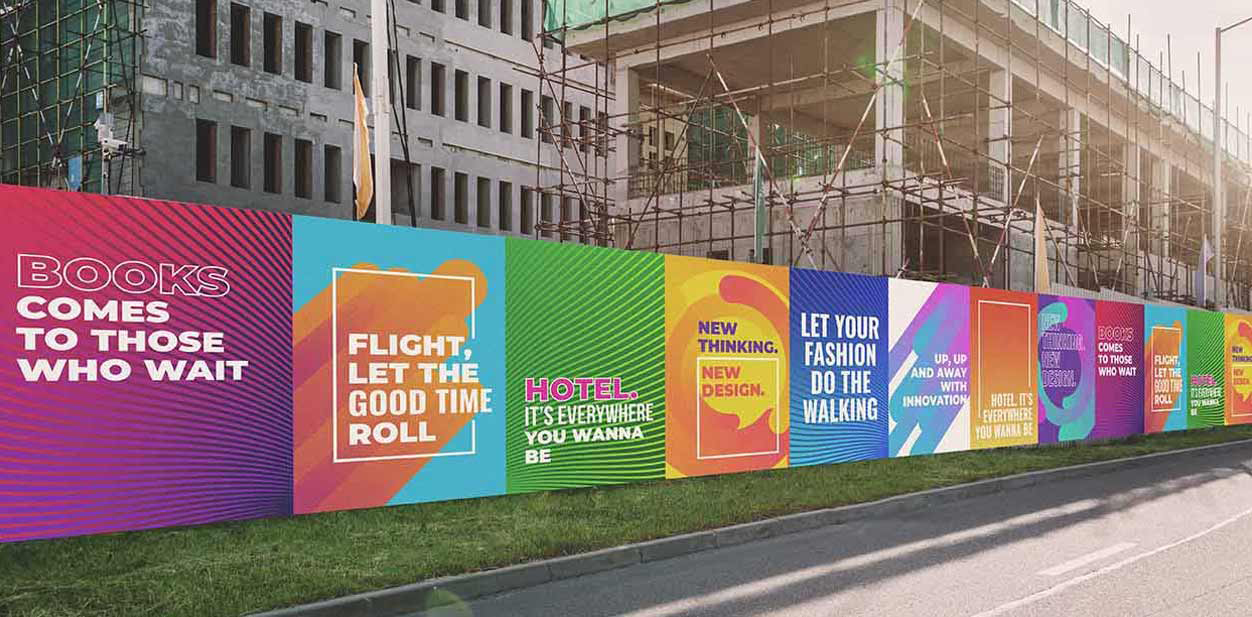 Large colorful-themed outdoor hoarding advertising for various types of businesses