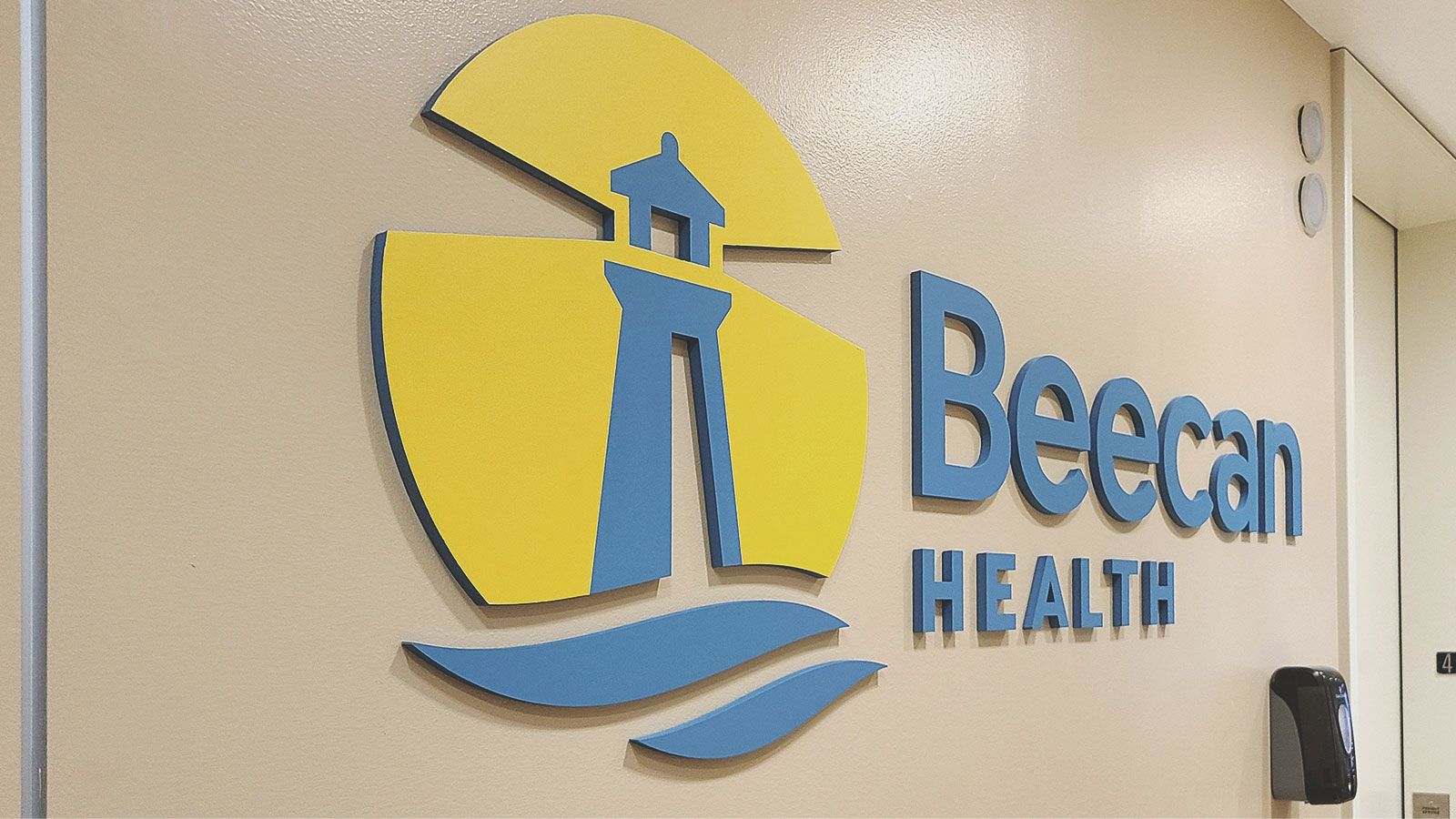 Beecan Health acrylic sign
