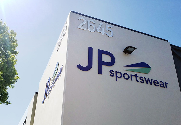 High rise outdoor storefront design solution for 'JP Sportswear'