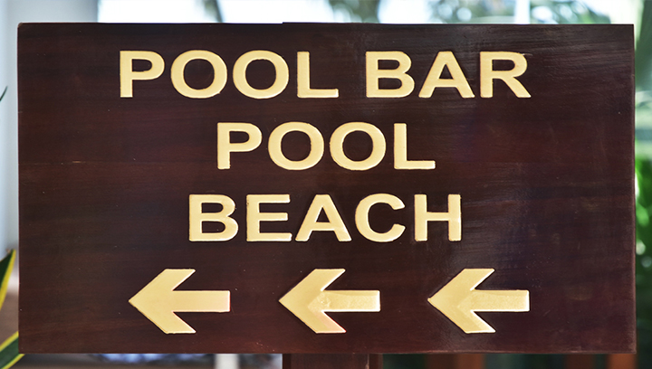 beach directional wooden sign