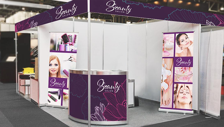 Beauty salon advertising signs in purple displayed at the trade show