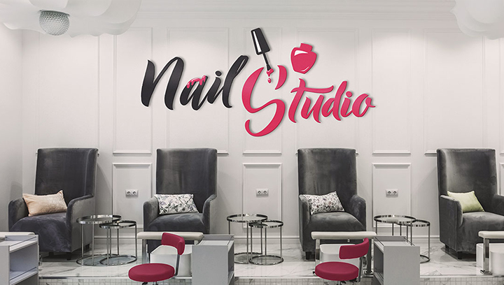 Custom nail salon sign in black and pink displaying the brand name and logo