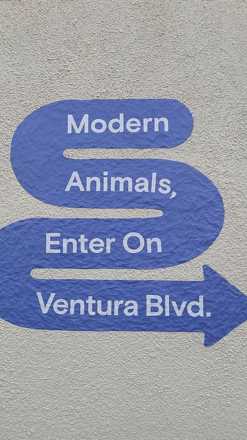 modern animal wayfinding sign