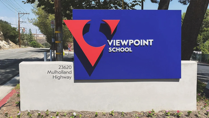 Ground-mounted exterior Viewpoint School sign featuring logo and school name - 2