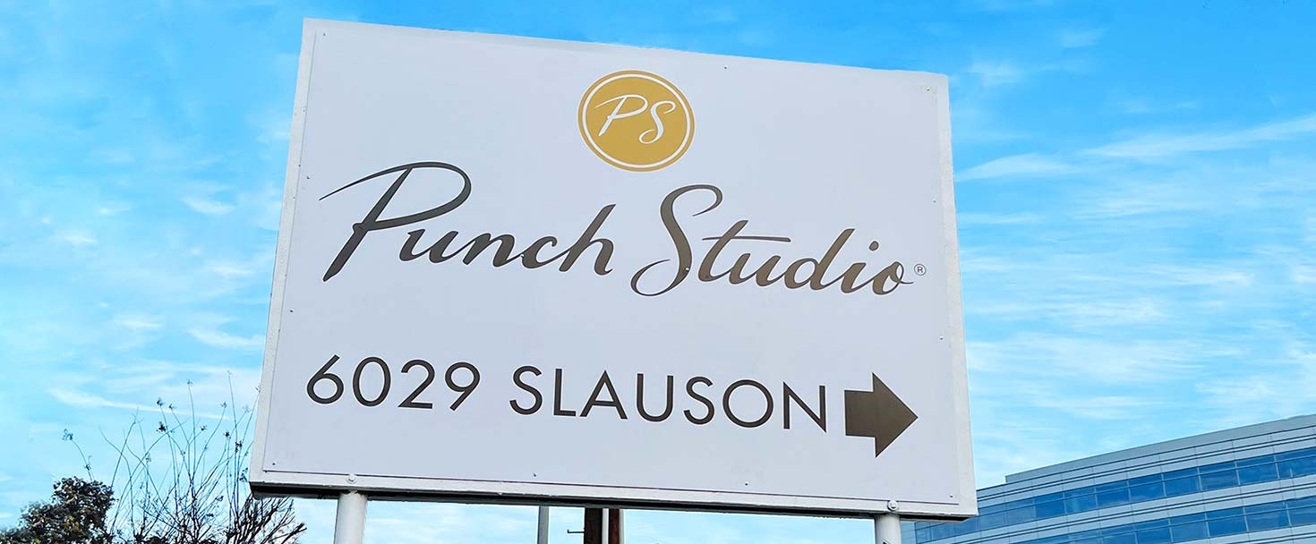 Punch Studio wayfinding signage guiding to the company premises made of lexan and opaque vinyl