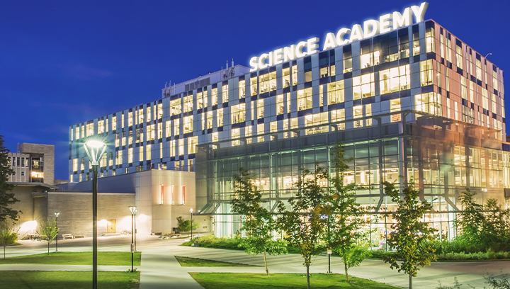 Lighting rooftop letters featuring Science Academy