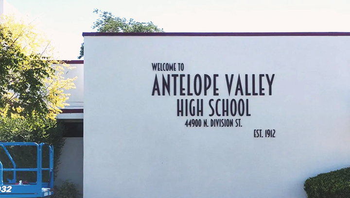 Aluminum storefront custom school sign with three-dimensional items featuring Antelope Valley High School