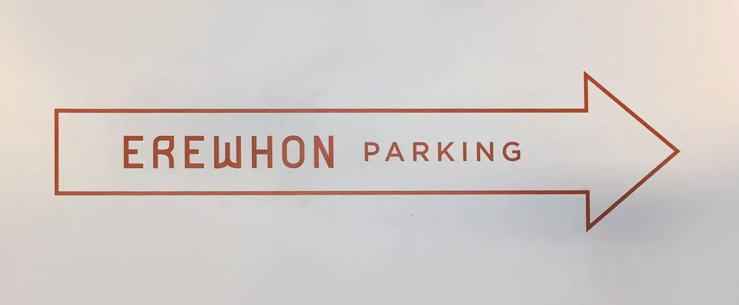 Interior wall wayfinding signage for Erewhon parking