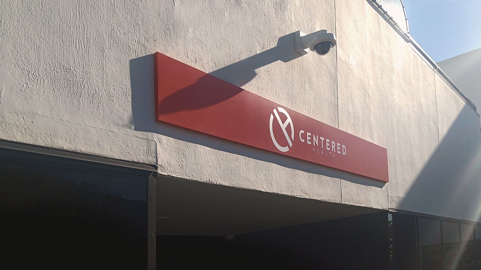 Centered health building sign