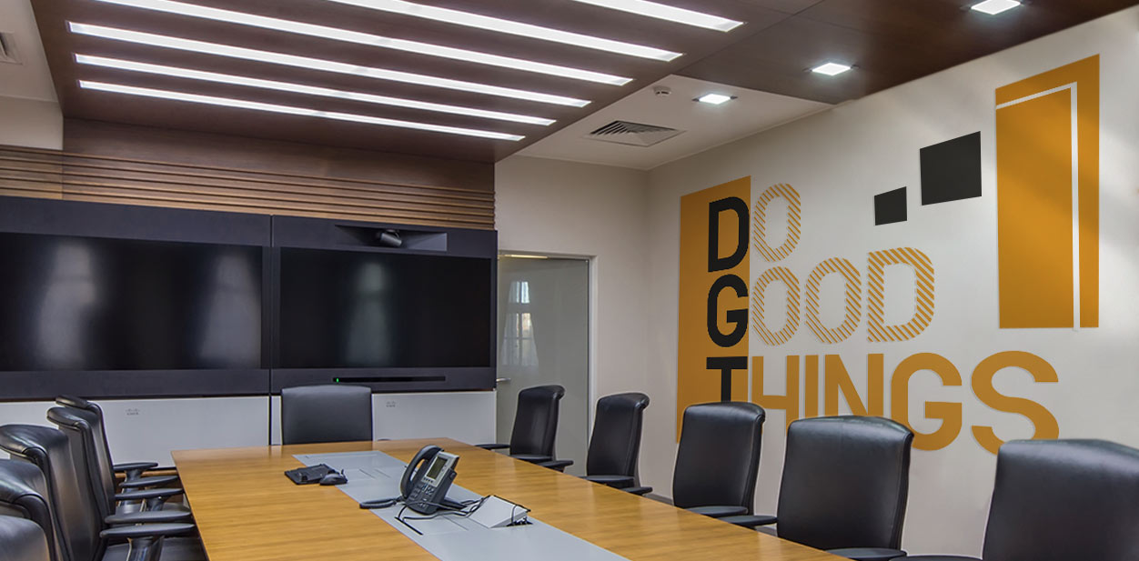 Conference call room design featuring big graphics with the text 'DO GOOD THINGS' on it