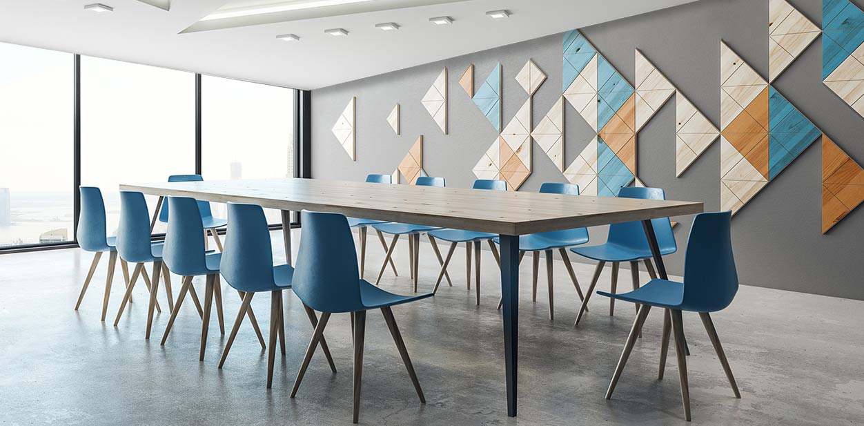 Custom conference room wall design with bright-colored shapes