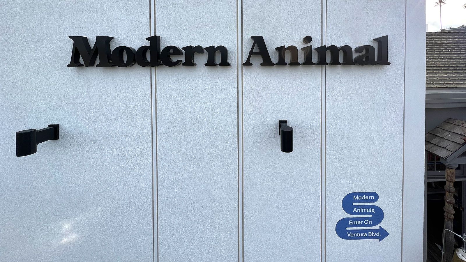 modern animal high rise sign