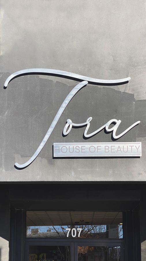 tora aluminum building sign