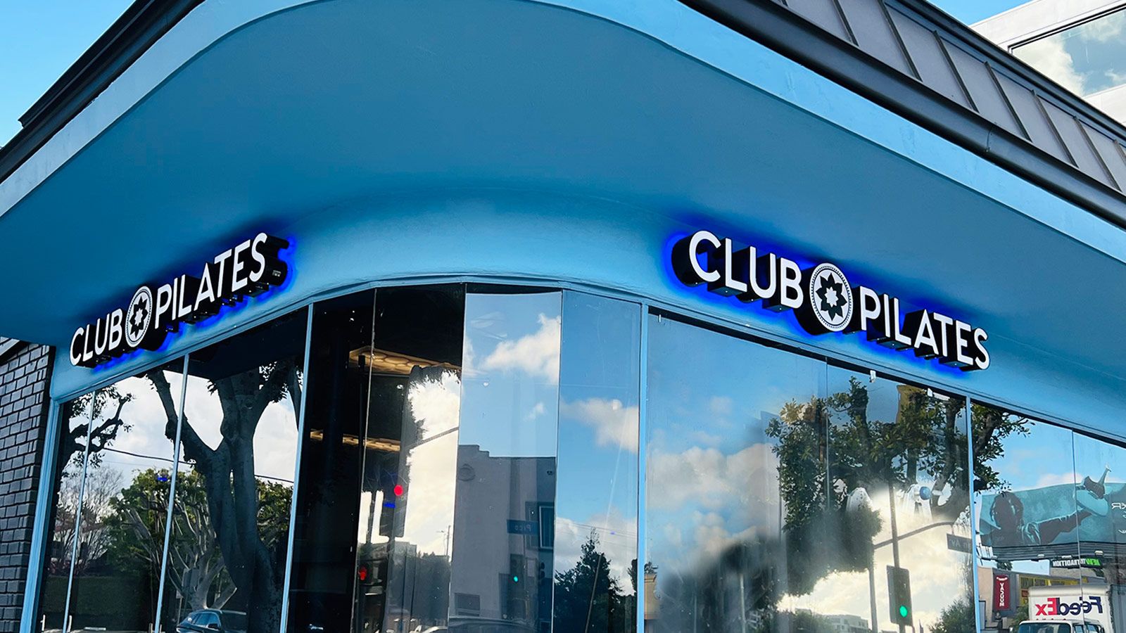 Club pilates outdoor sign installation