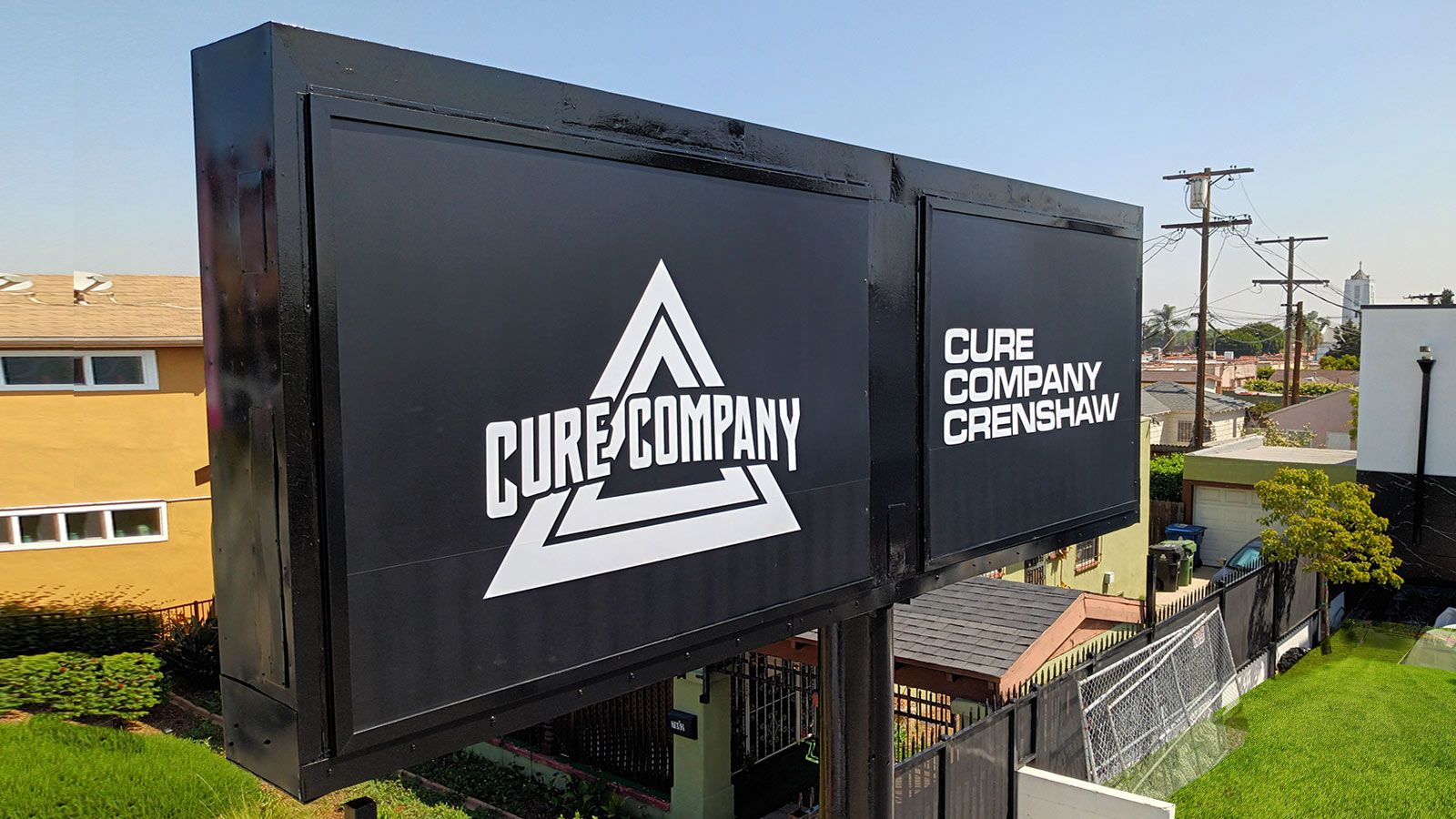 Cure Company pylon sign