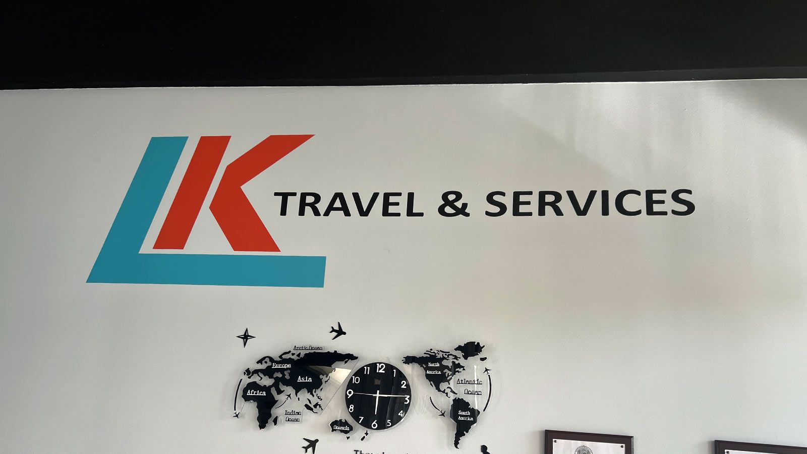 LK Travel & Services vinyl lettering