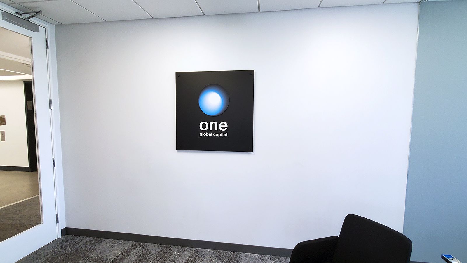 One global capital acrylic sign